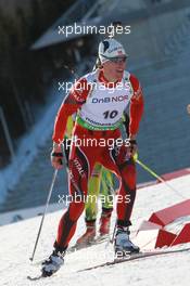 19.03.2011, Holmenkollen, Norway (NOR): Lars Berger (NOR), Madshus, Salomon, Swix, Odlo - IBU world cup biathlon, pursuit men, Holmenkollen (NOR). www.xpb.cc. © Manzoni/xpb.cc. Every downloaded picture is fee-liable.