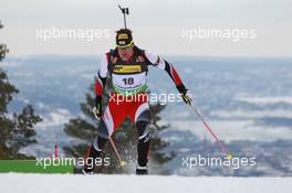 17.03.2011, Holmenkollen, Norway (NOR): Christoph Sumann (AUT), Atomic, Leki  - IBU world cup biathlon, sprint men, Holmenkollen (NOR). www.xpb.cc. © Manzoni/xpb.cc. Every downloaded picture is fee-liable.