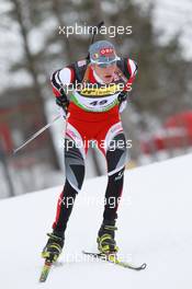 17.03.2011, Holmenkollen, Norway (NOR): Julian Eberhard (AUT), Atomic  - IBU world cup biathlon, sprint men, Holmenkollen (NOR). www.xpb.cc. © Manzoni/xpb.cc. Every downloaded picture is fee-liable.