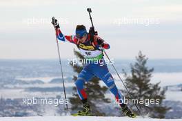 17.03.2011, Holmenkollen, Norway (NOR): Evgeny Ustyugov (RUS), Fischer, Rottefella, Swix, adidas - IBU world cup biathlon, sprint men, Holmenkollen (NOR). www.xpb.cc. © Manzoni/xpb.cc. Every downloaded picture is fee-liable.