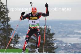 17.03.2011, Holmenkollen, Norway (NOR): Arnd Peiffer (GER), Fischer, Salomon, Swix, adidas - IBU world cup biathlon, sprint men, Holmenkollen (NOR). www.xpb.cc. © Manzoni/xpb.cc. Every downloaded picture is fee-liable.