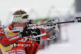 17.03.2011, Holmenkollen, Norway (NOR): Tarjei Boe (NOR), Fischer, Rottefella, Swix, ODLO - IBU world cup biathlon, sprint men, Holmenkollen (NOR). www.xpb.cc. © Manzoni/xpb.cc. Every downloaded picture is fee-liable.