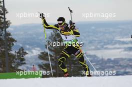 17.03.2011, Holmenkollen, Norway (NOR): Martin Fourcade (FRA), Rossignol, Rottefella, OneWay, Odlo - IBU world cup biathlon, sprint men, Holmenkollen (NOR). www.xpb.cc. © Manzoni/xpb.cc. Every downloaded picture is fee-liable.