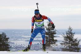 17.03.2011, Holmenkollen, Norway (NOR): Evgeny Ustyugov (RUS), Fischer, Rottefella, Swix, adidas - IBU world cup biathlon, sprint men, Holmenkollen (NOR). www.xpb.cc. © Manzoni/xpb.cc. Every downloaded picture is fee-liable.