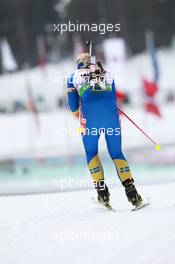 17.03.2011, Holmenkollen, Norway (NOR): Jenny Jonsson (SWE), Fischer, Rottefella, Leki, adidas - IBU world cup biathlon, sprint women, Holmenkollen (NOR). www.xpb.cc. © Manzoni/xpb.cc. Every downloaded picture is fee-liable.