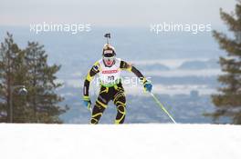 17.03.2011, Holmenkollen, Norway (NOR): Marie Dorin (FRA), Rossignol, Rottefella, OneWay - IBU world cup biathlon, sprint women, Holmenkollen (NOR). www.xpb.cc. © Manzoni/xpb.cc. Every downloaded picture is fee-liable.