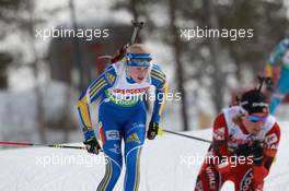 17.03.2011, Holmenkollen, Norway (NOR): Helena Ekholm (SWE), Fischer, Rottefella, Leki, adidas - IBU world cup biathlon, sprint women, Holmenkollen (NOR). www.xpb.cc. © Manzoni/xpb.cc. Every downloaded picture is fee-liable.