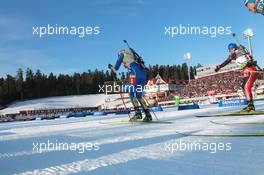 12.03.2011, Khanty-Mansiysk, Russia (RUS): Helena Ekholm (SWE), Fischer, Rottefella, Leki, adidas leads Magdalena Neuner (GER), Fischer, Rottefella, Exel, adidas, - IBU world championships biathlon, mass women, Khanty-Mansiysk (RUS). www.xpb.cc. © Manzoni/xpb.cc. Every downloaded picture is fee-liable.