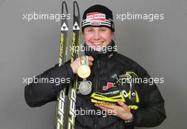 18.03.2011, Khanty-Mansiysk, Russia (RUS): Tina Bachmann (GER), Fischer, Rottefella, Swix, adidas  - IBU world championships biathlon, medals, Khanty-Mansiysk (RUS). www.xpb.cc. © Manzoni/xpb.cc. Every downloaded picture is fee-liable.