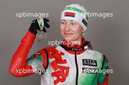 18.03.2011, Khanty-Mansiysk, Russia (RUS): Darya Domracheva (BLR), Fischer, Rottefella, Swix - IBU world championships biathlon, medals, Khanty-Mansiysk (RUS). www.xpb.cc. © Manzoni/xpb.cc. Every downloaded picture is fee-liable.
