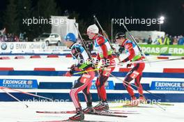 11.03.2011, Khanty-Mansiysk, Russia (RUS): Michael Greis (GER), Madshus, Rottefella, OneWay, adidas, Emil Hegle Svendsen (NOR), Madshus, Rottefella, Swix, Odlo, Tarjei Boe (NOR), Fischer, Rottefella, Swix, ODLO - IBU world championships biathlon, relay men, Khanty-Mansiysk (RUS). www.xpb.cc. © Manzoni/xpb.cc. Every downloaded picture is fee-liable.