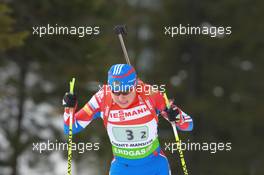 13.03.2011, Khanty-Mansiysk, Russia (RUS): Anna Bogaly-Titovets (RUS), Fischer, Rottefella, Alpina, OneWay, adidas - IBU world championships biathlon, relay women, Khanty-Mansiysk (RUS). www.xpb.cc. © Manzoni/xpb.cc. Every downloaded picture is fee-liable.