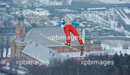 03.01.2011, Innsbruck, Austria (AUT): Martin Koch (AUT), Fischer, flying above Innsbruck   - FIS world cup ski jumping, four hills tournament, individual HS130, Innsbruck (AUT). www.xpb.cc. Â© Felgenhauer/xpb.cc. Every downloaded picture is fee-liable.