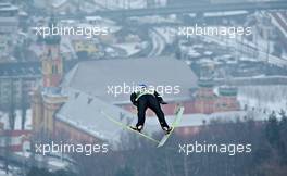 03.01.2011, Innsbruck, Austria (AUT): Adam Malysz (POL), Fischer, flying above Innsbruck  - FIS world cup ski jumping, four hills tournament, individual HS130, Innsbruck (AUT). www.xpb.cc. Â© Felgenhauer/xpb.cc. Every downloaded picture is fee-liable.