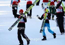 06.02.2011, Oberstdorf, Germany (GER): (l-r) Michael Uhrmann (GER), Fischer and Richard Freitag (GER), Fischer walking to the price giving ceremony  - FIS world cup ski jumping, team HS213, Oberstdorf (GER). www.xpb.cc. © Laiho/xpb.cc. Every downloaded picture is fee-liable.
