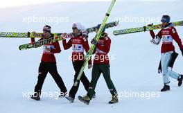 06.02.2011, Oberstdorf, Germany (GER): team Norway, (l-r) Anders Jacobsen (NOR), Fischer, Johan Remen Evensen (NOR), Elan, Tom Hilde (NOR), Fischer and Bjoern Einar Romoeren (NOR), Fischer walking to the victory ceremony  - FIS world cup ski jumping, team HS213, Oberstdorf (GER). www.xpb.cc. © Laiho/xpb.cc. Every downloaded picture is fee-liable.
