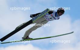 12.03.2011, Lahti, Finland (FIN): Anders Jacobsen (NOR), Fischer  - FIS world cup ski jumping, team HS130, Lahti (FIN). www.xpb.cc. © Laiho/xpb.cc. Every downloaded picture is fee-liable.