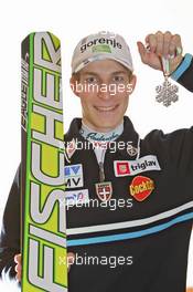 18.03.2011, Planica, Slovenia (SLO): Jurij Tepes (SLO), Fischer  - FIS world cup ski jumping final, medals, Planica (SLO). www.xpb.cc. © Hemmersbach/xpb.cc. Every downloaded picture is fee-liable.