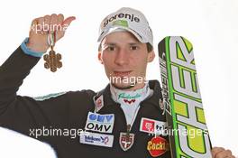 18.03.2011, Planica, Slovenia (SLO): Robert Kranjec (SLO), Fischer  - FIS world cup ski jumping final, medals, Planica (SLO). www.xpb.cc. © Hemmersbach/xpb.cc. Every downloaded picture is fee-liable.