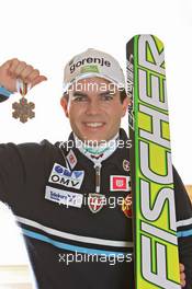 18.03.2011, Planica, Slovenia (SLO): Jernej Damjan (SLO), Fischer  - FIS world cup ski jumping final, medals, Planica (SLO). www.xpb.cc. © Hemmersbach/xpb.cc. Every downloaded picture is fee-liable.