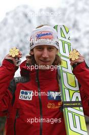 18.03.2011, Planica, Slovenia (SLO): Martin Koch (AUT), Fischer  - FIS world cup ski jumping final, medals, Planica (SLO). www.xpb.cc. © Hemmersbach/xpb.cc. Every downloaded picture is fee-liable.