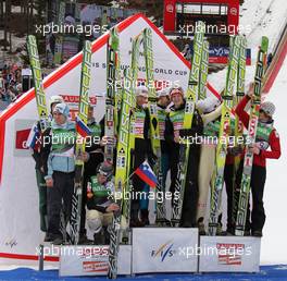 19.03.2011, Planica, Slovenia (SLO): podium, l-r: 3rd Team Slovenia, 1st Team Austria, 2nd Team Norway - FIS world cup ski jumping final, team HS215, Planica (SLO). www.xpb.cc. © Hemmersbach/xpb.cc. Every downloaded picture is fee-liable.