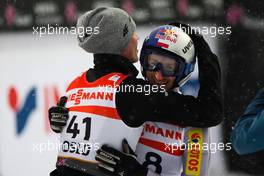 26.02.2011, Oslo, Norway (NOR): (l-r) Kamil Stoch (POL), Fischer congratules Adam Malysz (POL), Fischer  - FIS nordic world ski championships, ski jumping, individual HS106, Oslo (NOR). www.xpb.cc. © Laiho/xpb.cc. Every downloaded picture is fee-liable.