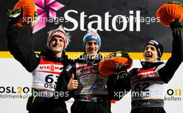 03.03.2011, Oslo, Norway (NOR): (l-r) Thomas Morgenstern (AUT), Fischer, Gregor Schlierenzauer (AUT), Fischer and Simon Ammann (SUI), Fischer  - FIS nordic world ski championships, ski jumping, individual HS134, Oslo (NOR). www.xpb.cc. © Laiho/xpb.cc. Every downloaded picture is fee-liable.