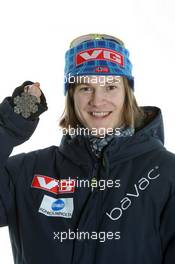 27.02.2011, Oslo, Norway (NOR): Silver Medal Team; Tom Hilde (NOR), Fischer - FIS nordic world ski championships, ski jumping, medals, Oslo (NOR). www.xpb.cc. © Hemmersbach/xpb.cc. Every downloaded picture is fee-liable.