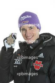 27.02.2011, Oslo, Norway (NOR): Bronce Medal Team; Martin Schmitt (GER) - FIS nordic world ski championships, ski jumping, medals, Oslo (NOR). www.xpb.cc. © Hemmersbach/xpb.cc. Every downloaded picture is fee-liable.