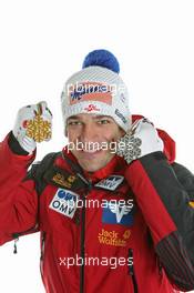 27.02.2011, Oslo, Norway (NOR): Gold Medal Team; Andreas Kofler (AUT), Fischer - FIS nordic world ski championships, ski jumping, medals, Oslo (NOR). www.xpb.cc. © Hemmersbach/xpb.cc. Every downloaded picture is fee-liable.