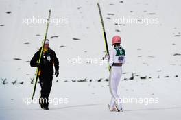 27.02.2011, Oslo, Norway (NOR): Severin Freund (GER), Fischer (r) fell his second jump  - FIS nordic world ski championships, ski jumping, team HS106, Oslo (NOR). www.xpb.cc. © Laiho/xpb.cc. Every downloaded picture is fee-liable.
