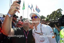 Nico Hulkenberg (GER) Sahara Force India F1 with fans. 14.03.2014. Formula 1 World Championship, Rd 1, Australian Grand Prix, Albert Park, Melbourne, Australia, Practice Day.