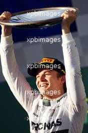 Race winner Nico Rosberg (GER) Mercedes AMG F1 celebrates on the podium. 16.03.2014. Formula 1 World Championship, Rd 1, Australian Grand Prix, Albert Park, Melbourne, Australia, Race Day.