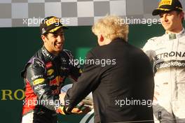 Second placed Daniel Ricciardo (AUS) Red Bull Racing receives his trophy from Ron Walker (AUS) Chairman of the Australian GP Corporation on the podium. 16.03.2014. Formula 1 World Championship, Rd 1, Australian Grand Prix, Albert Park, Melbourne, Australia, Race Day.