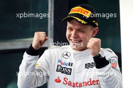 Kevin Magnussen (DEN) McLaren celebrates his third position on the podium. 16.03.2014. Formula 1 World Championship, Rd 1, Australian Grand Prix, Albert Park, Melbourne, Australia, Race Day.