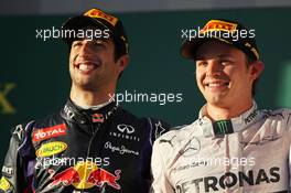 The podium (L to R): second placed Daniel Ricciardo (AUS) Red Bull Racing with race winner Nico Rosberg (GER) Mercedes AMG F1. 16.03.2014. Formula 1 World Championship, Rd 1, Australian Grand Prix, Albert Park, Melbourne, Australia, Race Day.