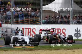Valtteri Bottas (FIN) Williams FW36 and Romain Grosjean (FRA) Lotus F1 E22 battle for position. 16.03.2014. Formula 1 World Championship, Rd 1, Australian Grand Prix, Albert Park, Melbourne, Australia, Race Day.