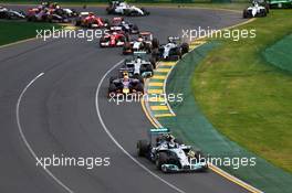 Nico Rosberg (GER) Mercedes AMG F1 W05 leads at the start of the race as Kamui Kobayashi (JPN) Caterham CT05 and Felipe Massa (BRA) Williams FW36 crash out. 16.03.2014. Formula 1 World Championship, Rd 1, Australian Grand Prix, Albert Park, Melbourne, Australia, Race Day.