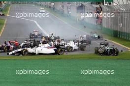 Kamui Kobayashi (JPN) Caterham CT05 crashes into Felipe Massa (BRA) Williams FW36 at the start of the race. 16.03.2014. Formula 1 World Championship, Rd 1, Australian Grand Prix, Albert Park, Melbourne, Australia, Race Day.