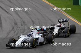 Valtteri Bottas (FIN) Williams FW36 leads Jenson Button (GBR) McLaren MP4-29. 16.03.2014. Formula 1 World Championship, Rd 1, Australian Grand Prix, Albert Park, Melbourne, Australia, Race Day.