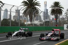 (L to R): Jenson Button (GBR) McLaren MP4-29 and Daniil Kvyat (RUS) Scuderia Toro Rosso STR9. 15.03.2014. Formula 1 World Championship, Rd 1, Australian Grand Prix, Albert Park, Melbourne, Australia, Qualifying Day.