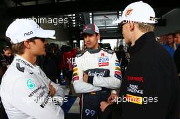 (L to R): Nico Rosberg (GER) Mercedes AMG F1 with Adrian Sutil (GER) Sauber and Nico Hulkenberg (GER) Sahara Force India F1. 16.03.2014. Formula 1 World Championship, Rd 1, Australian Grand Prix, Albert Park, Melbourne, Australia, Race Day.