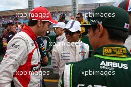 (L to R): Jules Bianchi (FRA) Marussia F1 Team with Felipe Massa (BRA) Williams and Kamui Kobayashi (JPN) Caterham on the drivers parade. 16.03.2014. Formula 1 World Championship, Rd 1, Australian Grand Prix, Albert Park, Melbourne, Australia, Race Day.