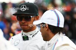 (L to R): Lewis Hamilton (GBR) Mercedes AMG F1 with Felipe Massa (BRA) Williams on the drivers parade. 16.03.2014. Formula 1 World Championship, Rd 1, Australian Grand Prix, Albert Park, Melbourne, Australia, Race Day.