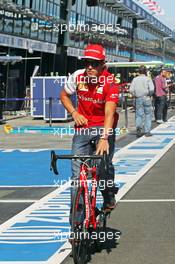 Fernando Alonso (ESP) Ferrari cycles the circuit. 12.03.2014. Formula 1 World Championship, Rd 1, Australian Grand Prix, Albert Park, Melbourne, Australia, Preparation Day.