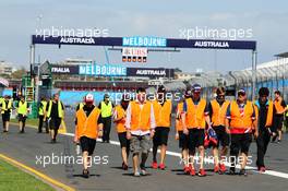 Hi-vis jackets worn as support race teams walk the circuit. 12.03.2014. Formula 1 World Championship, Rd 1, Australian Grand Prix, Albert Park, Melbourne, Australia, Preparation Day.