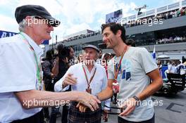 (L to R): Sir James Dyson (GBR) Inventor with Jackie Stewart (GBR) and Mark Webber (AUS) Porsche Team WEC Driver on the grid. 22.06.2014. Formula 1 World Championship, Rd 8, Austrian Grand Prix, Spielberg, Austria, Race Day.