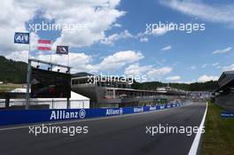 The grid and pits. 22.06.2014. Formula 1 World Championship, Rd 8, Austrian Grand Prix, Spielberg, Austria, Race Day.