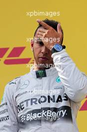 Second placed Lewis Hamilton (GBR) Mercedes AMG F1 on the podium. 22.06.2014. Formula 1 World Championship, Rd 8, Austrian Grand Prix, Spielberg, Austria, Race Day.
